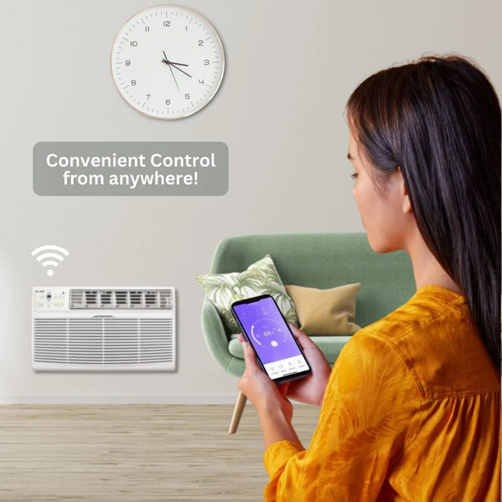 Woman using a smartphone app to control an air conditioner with a clock on the wall.